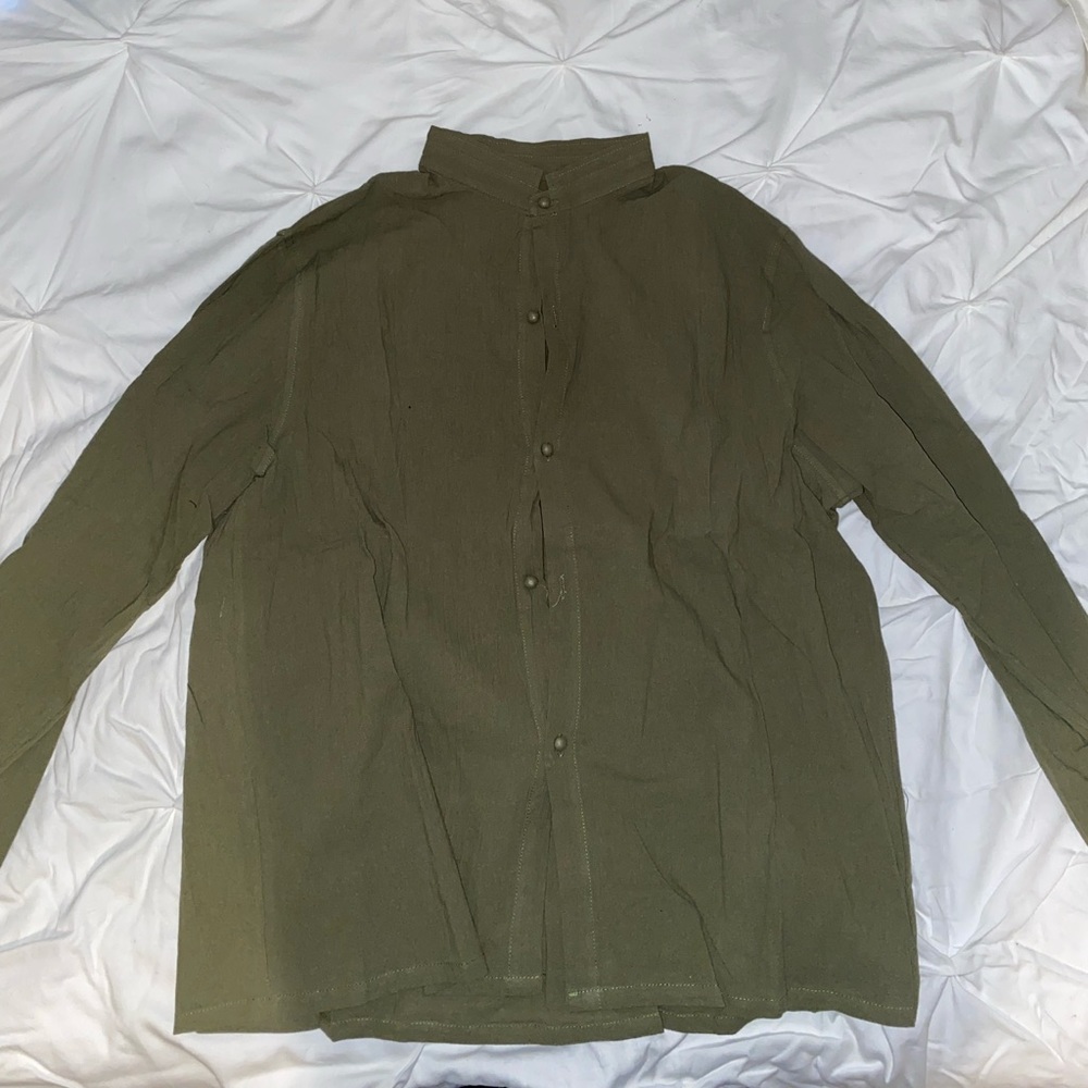 Men’s 3XL shirt, never worn, still original packaging.